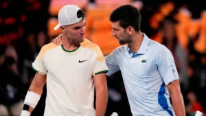 Kemenangan Novak Djokovic selamat dari ketakutan melawan lawannya yang berusia 18 tahun untuk memenangkan pertandingan putaran pertama Australia Terbuka yang mendebarkan 